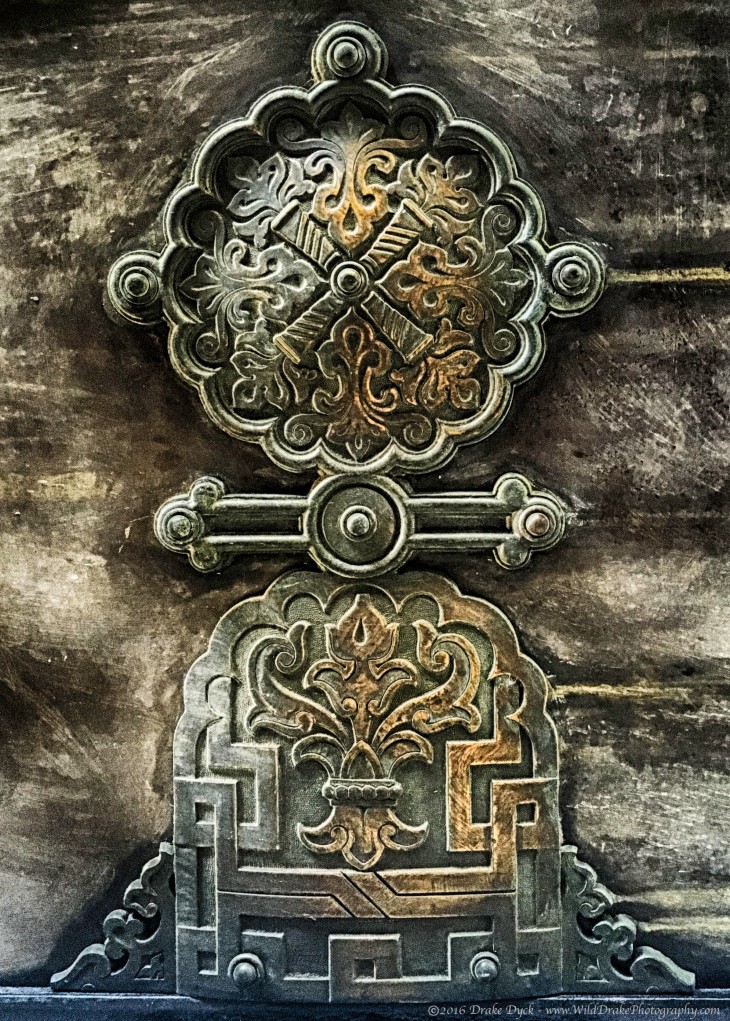 ornate brass door hinge